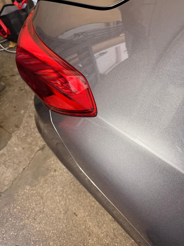 Paint by the taillight, before