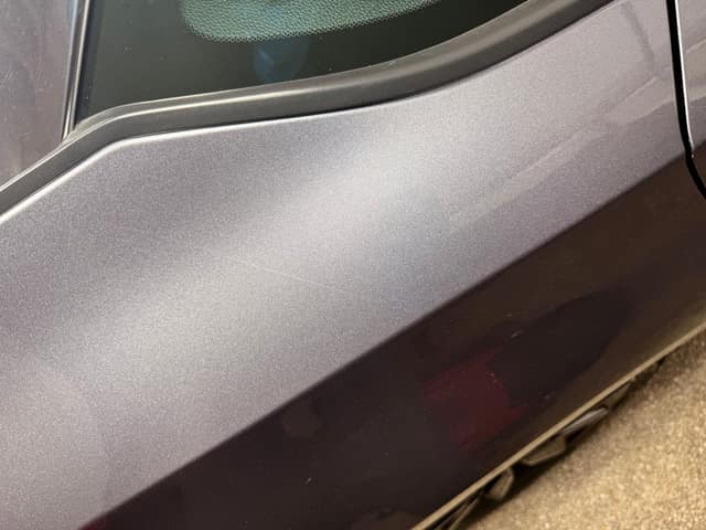 Paint near the rear window, before