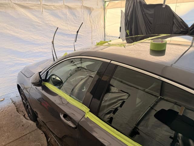 Window trim masked with tape