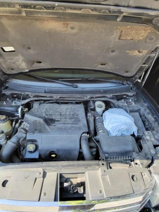 Ford Flex engine bay, before
