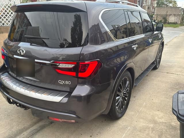 Infiniti QX80, rear three-quarter view outdoors
